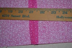 Cotton fabric, two-toned pink dots, 57″ x 74″ unfinished project