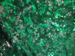 Green and Silver Sharmrock Print on Green Mesh Fabric 60 W x 2 yd AS IS Damaged