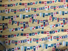 RILEY BLAKE – FLY AWEIGH #C3873 FLAGS – YELLOW- BY THE YARD