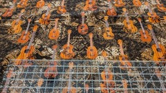 Hawaiian/Polynesian Tribal UKULELE Print w/Tapa Cloth background COTTON FABRIC