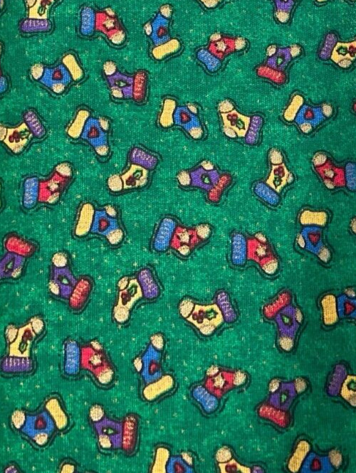 GENERAL FABRICS – STOCKINGS ON GREEN– 1 YARD