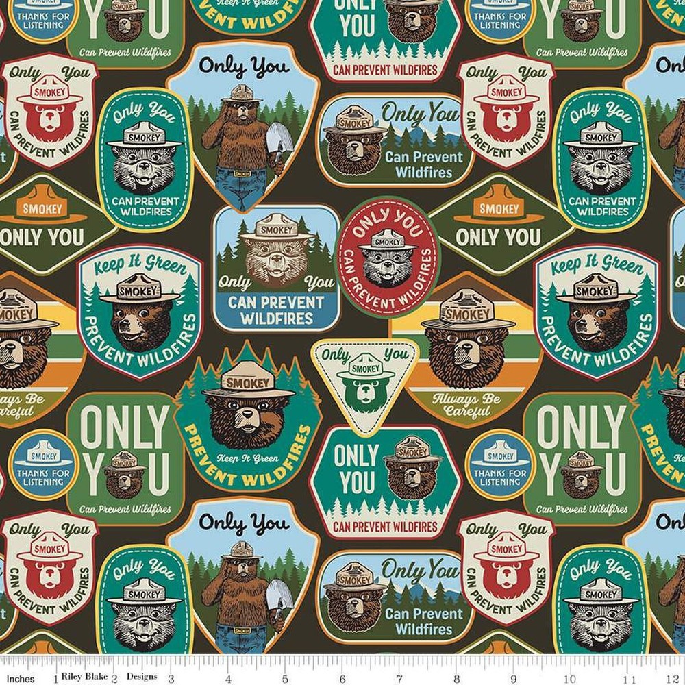 Smokey the Bear Badges on Bark brown BT Yard x 44 wide cotton Riley Blake