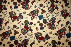 JOY OF TOYS ON TAN FLANNELBY FAYE BURGOS FOR MARCUS – 100% COTTON FABRIC