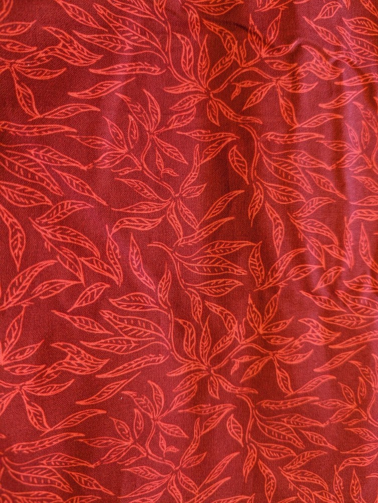 Keepsake Calico fabric – red leaves and branches – 45″x204″