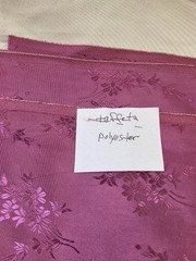 Polyester Taffeta fabric in dusty rose with floral jacquard design 47″ x 18.5″