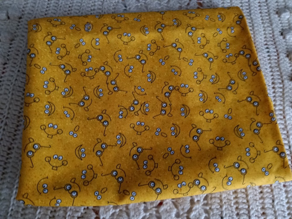 New Avlyn Cotton Fabric, Multicolor Yellow w/Cartoon Type Faces,44″x1yd