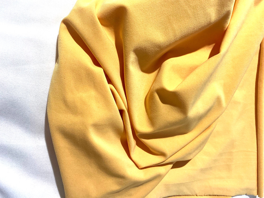 Solid yellow cotton,polyester,lycra blend fabric 32″x 60″ (4 way stretch)