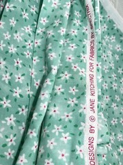 Small White Flowers Red Centers on Fresh Mint Green BTY Spectrix Cotton Fabric