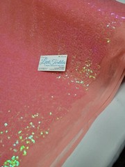 Iridescent Neon Coral Glitz Sequin Fabric / 3mm Sequin on Poly Mesh – Sold BTY