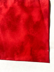 Cotton print fabric-tonal shades of red with gold glitter accents 43″ x 44″