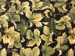 OLIVE & TAN LEAVES ON BLACK FABRIC 1 3/8 YARDS