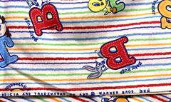 Tiny Toon Characters Alphabet Primary Colors on White 1Y Warner Brothers Fabric