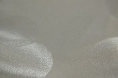 cream polyester jacquard fabric, circles 90 L” x 44″ W (2.5 yds)