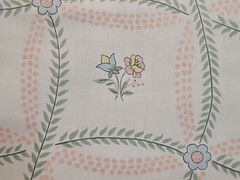 American legacy fabric beige polished cotton w/vines and small flowers 1981