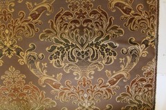 Damask medallion scroll upholstery material in taupe/brown/gold multi on taupe
