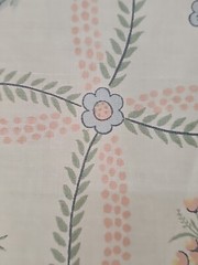 American legacy fabric beige polished cotton w/vines and small flowers 1981