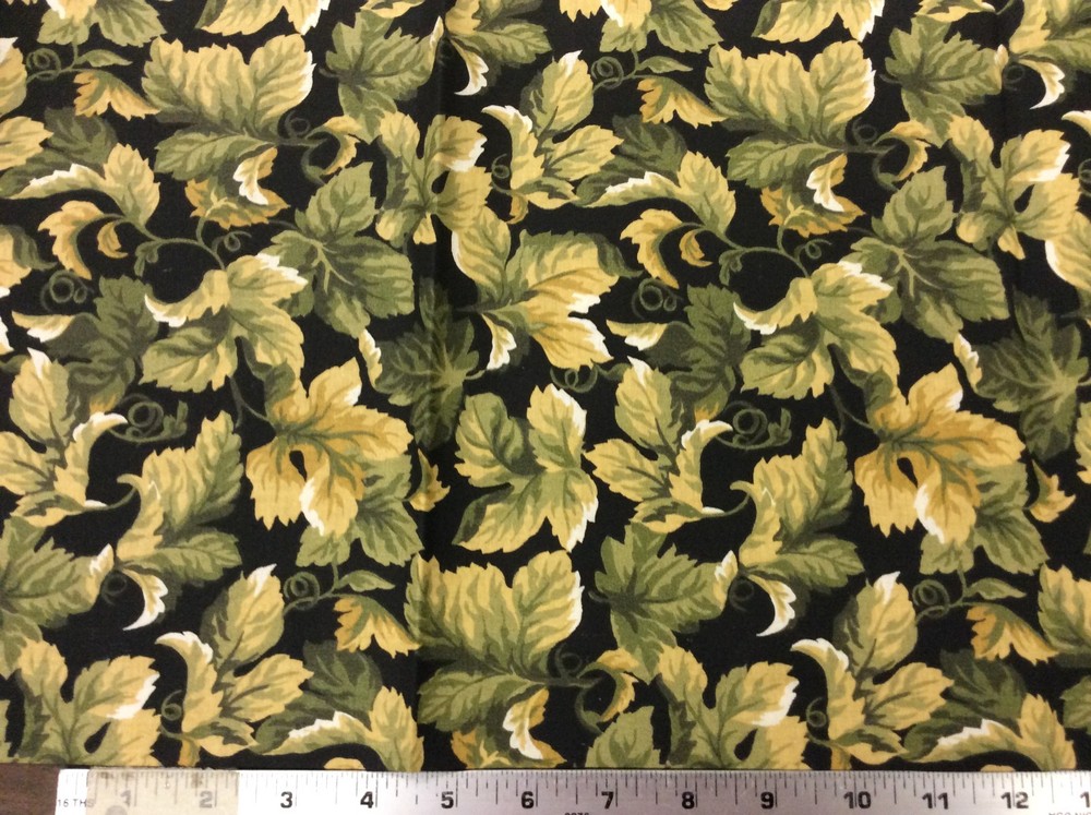 OLIVE & TAN LEAVES ON BLACK FABRIC 1 3/8 YARDS