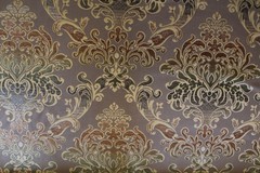 Damask medallion scroll upholstery material in taupe/brown/gold multi on taupe