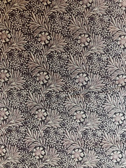 Marigold design designed by William Morris in dark and light purples.