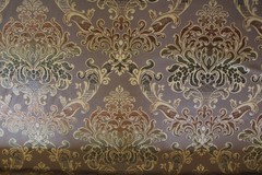 Damask medallion scroll upholstery material in taupe/brown/gold multi on taupe