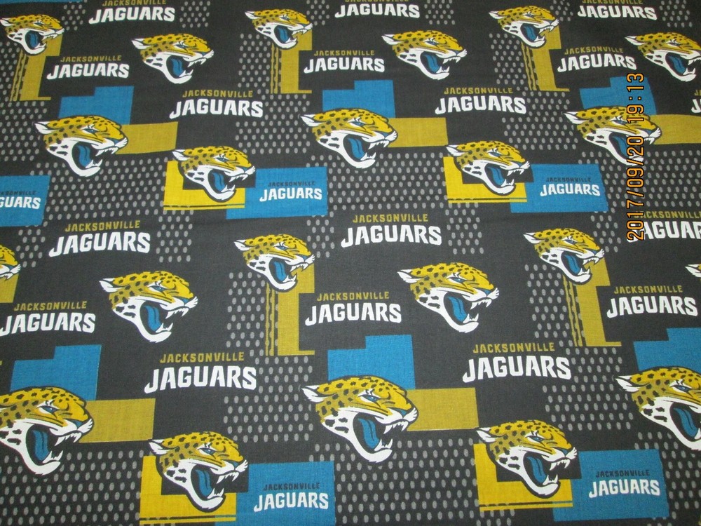 JACKSOVILLE “JAGS ” NFL FABRIC 100% COTTON BRAND NEW DESIGN 1/2 YARD PIECE