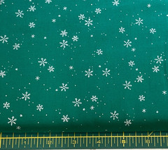 JOANN – SILVER METALLIC SNOWFLAKES ON GREEN COTTON– BY THE YARD