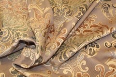Damask medallion scroll upholstery material in taupe/brown/gold multi on taupe