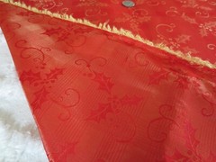 4414. Woven GOLDEN HOLLY on RED Silky Synthetic FABRIC – 65″ x 2-3/8 yds.