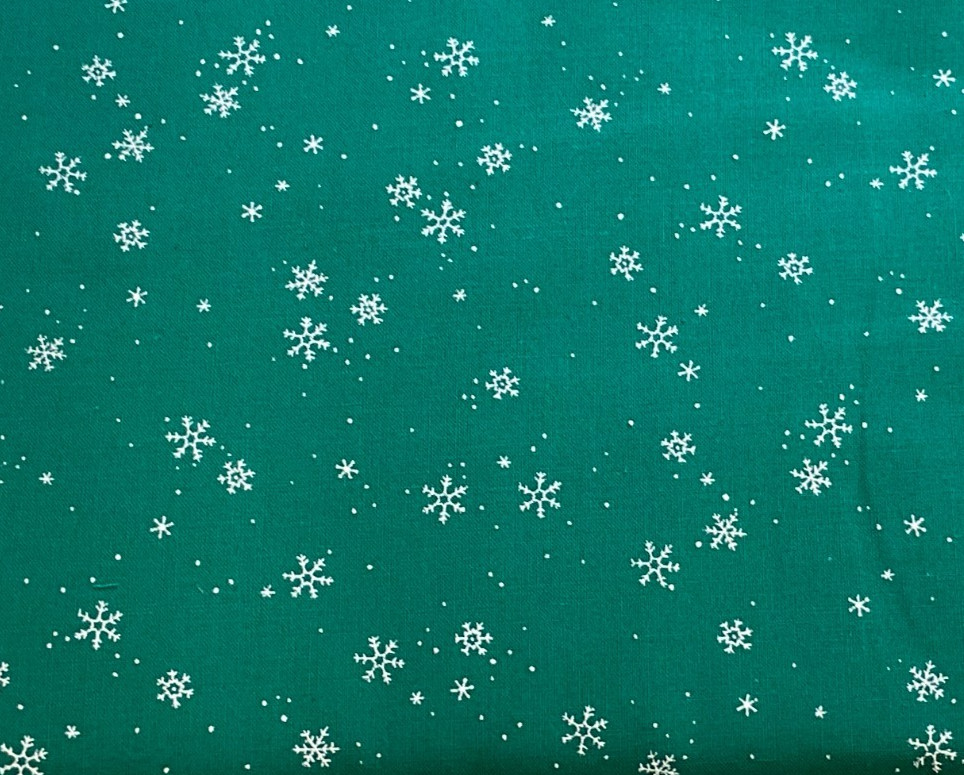 JOANN – SILVER METALLIC SNOWFLAKES ON GREEN COTTON– BY THE YARD