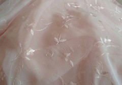Discount embroidered pink Voile 110″ wide by yard. Semi sheer. Free swatches.