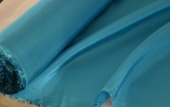 Turquoise Taffeta 100% Polyester 59/60″ wide by the yard or roll. Free swatches.