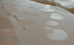 cream polyester jacquard fabric, circles 90 L” x 44″ W (2.5 yds)