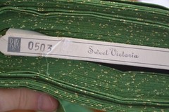 By 1/2 Yd, White Calico on Green Quilt Cotton, RJR/Hasegawa/Sweet Victoria, B665