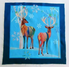 Deer Horns Snowflakes on Light Blue Pic A- 10 1/2″ L x 10 1/4″ W Light Blue Edge