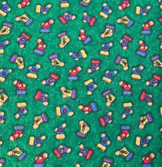 GENERAL FABRICS – STOCKINGS ON GREEN– 1 YARD