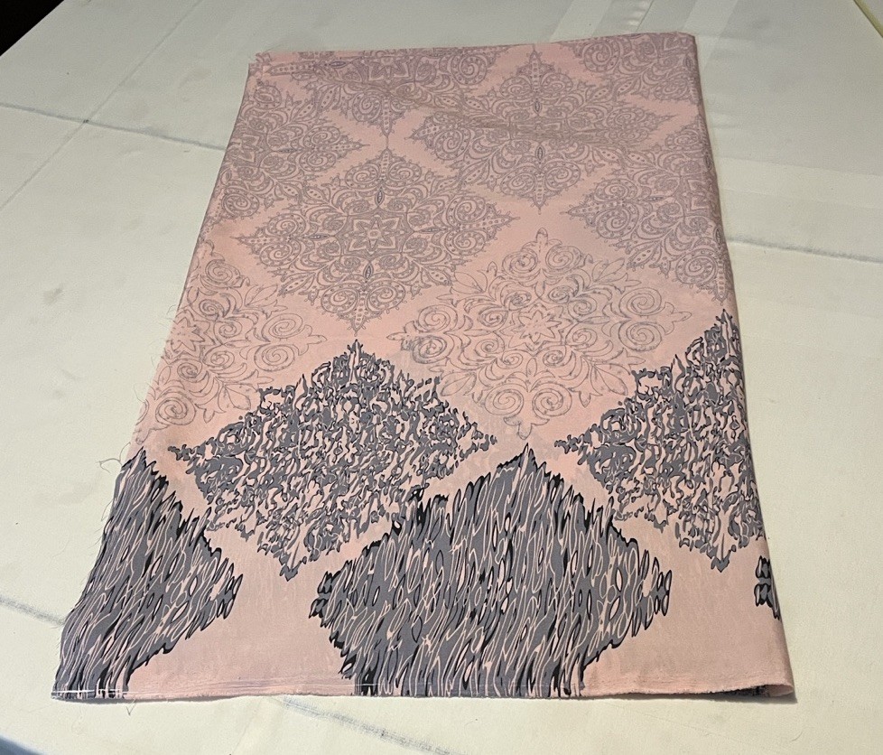 Peach Fabric With Distinctive Design In Black And Grey 4Y By 60” Approximately