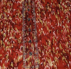 1 yard 100% COTTON FABRIC textile arts film RED BURGUNDY METALLIC GOLD abstract