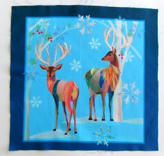 Deer Horns Snowflakes on Light Blue Pic B- 10 1/2″ L x 10 1/4″ W Light Blue Edge
