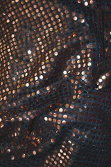 HALLOWEEN SPIRIT 1/4″ ORANGE SEQUINS ON BLACK METALLIC MESH FABRIC 48X41 INCHS