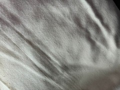 Unbleached Muslin Fabric 5 yards undyed surface with a natural cream color