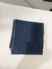 Jean like fabric material for sale by the yard (still on original roll)