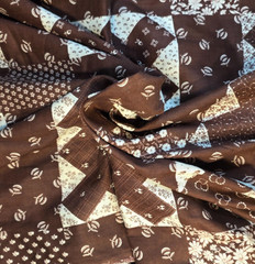 “Noon and Night” Brown Vintage Cotton Quilting Fabric by Concord Fabrics