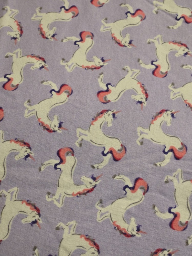 Cotton Knit Fabric. Unicorns on Purple. 1 yd 22″ x 58″