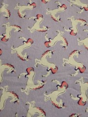 Cotton Knit Fabric. Unicorns on Purple. 1 yd 22″ x 58″
