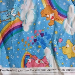 Care Bears Cartoon Print Fabric Blue Rainbow Clouds 44″ W x 89″ L NWOT Vintage