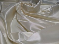Ivory Taffeta 100% Polyester 59/60″ wide by the yard or roll. Free swatches.
