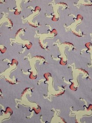 Cotton Knit Fabric. Unicorns on Purple. 1 yd 22″ x 58″