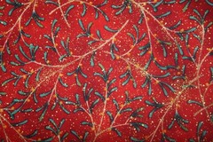WINTER’S NIGHT-CHRISTMAS GREENERY ON RED FROM MAYWOOD – 100% COTTON FABRIC