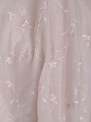 Discount embroidered pink Voile 110″ wide by yard. Semi sheer. Free swatches.