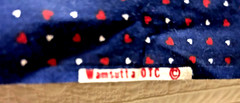 Navy material with tiny red & white hearts 3yards 110″ X 44″